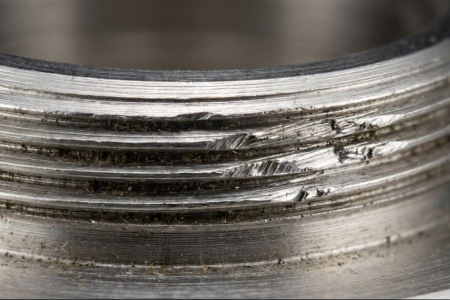 stripped rolex case tube threads macro